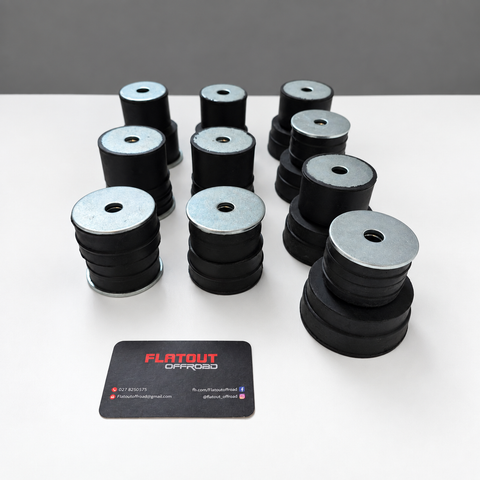Toyota Land Cruiser 79 Series body mount bushing kit with black rubber bushes